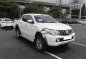 Selling White Mitsubishi Strada 2018 Automatic Diesel -1