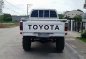 Selling White Toyota Hilux 2000 at 159000 km -4