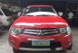 Red Mitsubishi Strada 2011 at 67256 km for sale-1