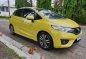 Yellow Honda Jazz 2015 Hatchback at 45000 km for sale -1
