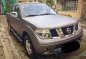 Silver Nissan Frontier Navara 2013 at 97000 km for sale-3