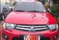 Red Mitsubishi Strada 2014 Automatic Diesel for sale -4