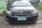 Black Toyota Corolla Altis 2010 at 160000 km for sale -0