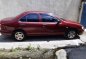 Red Nissan Sentra 2000 at 118000 km for sale-1