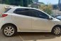 White Mazda 2 2011 at 74000 km for sale-1