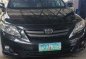 Black Toyota Corolla Altis 2010 at 160000 km for sale -1