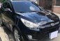 Black Hyundai Tucson 2011 Automatic Gasoline for sale -0