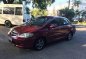 Red Honda City 2006 at 59000 km for sale -0