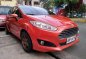 Sell Orange 2015 Ford Fiesta Hatchback at 31000 km -1