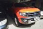 Orange Ford Ranger 2015 at 57049 km for sale -0