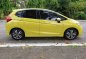 Yellow Honda Jazz 2015 Hatchback at 45000 km for sale -2