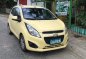 Yellow Chevrolet Spark 2013 Hatchback for sale in Manila -0