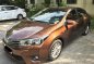 Brown Toyota Corolla 2014 for sale in Quezon City-1