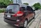 Red Suzuki Ertiga 2018 at 6000 km for sale in Quezon City-3