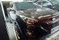 Brown Hyundai Tucson 2014 for sale in Quezon City -1