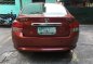 Red Honda City 2009 at 94000 km for sale -3