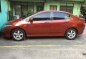 Red Honda City 2009 at 94000 km for sale -5