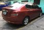 Red Honda City 2009 at 94000 km for sale -2