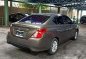 Brown Nissan Almera 2016 at 56000 km for sale -3