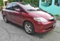 Red Honda City 2004 at 180000 km for sale-1
