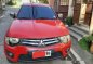 Sell Red 2014 Mitsubishi Strada at 92000 km-0