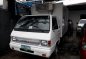 Selling White Mitsubishi L300 2012 in Caloocan-1