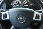 Green Jeep Commander 2008 at 109000 km for sale -5