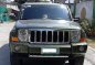 Green Jeep Commander 2008 at 109000 km for sale -0