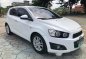 White Chevrolet Sonic 2013 Automatic Gasoline for sale -0
