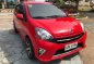 Red Toyota Wigo 2015 for sale in Cebu -0