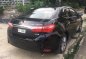 Selling Black Toyota Corolla Altis 2016 at 42000 km-2