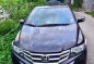 Sell Black 2014 Honda City-1