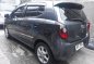 Black Toyota Wigo 2015 at 61000 km for sale -1