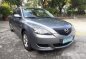 Grey Mazda 3 2004 at 35000 km for sale-0