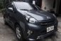 Black Toyota Wigo 2015 at 61000 km for sale -0