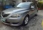 Grey Mazda 3 2004 at 35000 km for sale-1