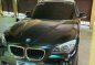 Selling Black Bmw X1 2011 at 20000 km -0