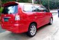 Red Toyota Innova 2013 Manual Diesel for sale-1