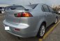 Silver Mitsubishi Lancer Ex 2010 for sale in Quezon City-1