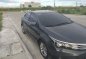 Selling Black Toyota Corolla Altis 2014 -2