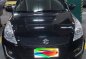 Selling Black Suzuki Swift 2014 Automatic Gasoline  -1