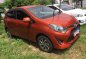 Orange Toyota Wigo 2018 for sale in Cainta-1