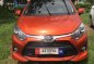 Orange Toyota Wigo 2018 for sale in Cainta-0