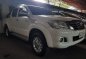 Selling White Toyota Hilux 2014 at 10000 km -1