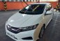 Selling White Honda City 2016 Automatic Gasoline  -2