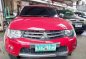 Selling Red Mitsubishi Strada 2010 in Quezon City-0
