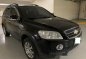 Selling Black Chevrolet Captiva 2011 at 79556 km-0