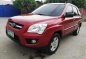 Red Kia Sportage 2010 for sale in Talisay-1