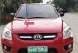 Red Kia Sportage 2010 for sale in Talisay-0