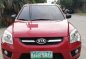 Red Kia Sportage 2010 for sale in Talisay-6